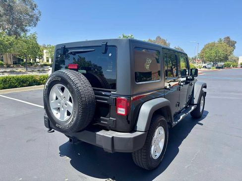 Used 2013 Jeep Wrangler Unlimited Sport AWD/4WD image 2