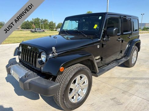 Used 2015 Jeep Wrangler Unlimited Sahara AWD/4WD image 1