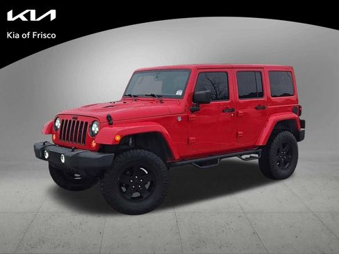 Used 2015 Jeep Wrangler Unlimited Sahara AWD/4WD image 1