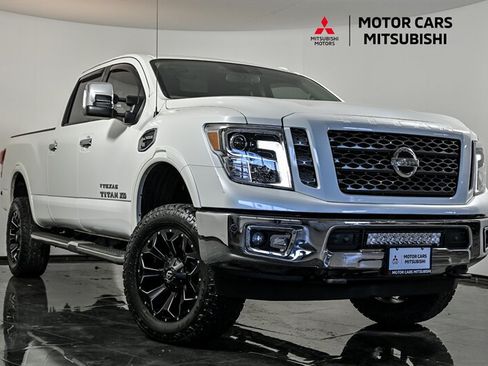 Used 2017 Nissan Titan SL w/ Texas Titan Edition AWD/4WD image 1