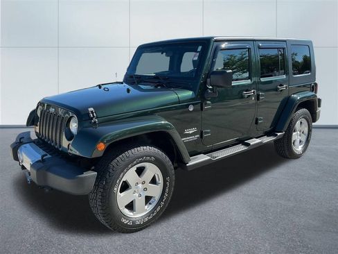 Used 2010 Jeep Wrangler Unlimited Sahara w/ Dual Top Group AWD/4WD image 2