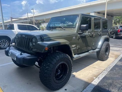 Used 2015 Jeep Wrangler Unlimited Sahara w/ Max Tow Package AWD/4WD image 1
