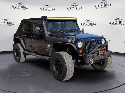 Used 2012 Jeep Wrangler Unlimited Sport image 1