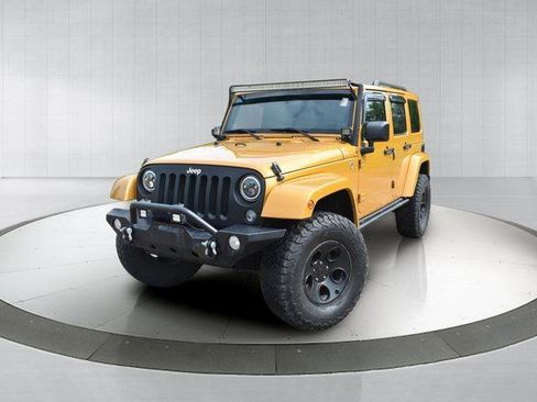 Used 2014 Jeep Wrangler Unlimited Sahara w/ Connectivity Group AWD/4WD image 1