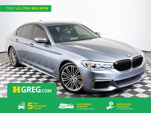 Used 2019 BMW M550i xDrive w/ Premium Package image 1