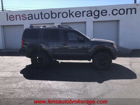 Used 2013 Nissan Xterra PRO-4X image 1