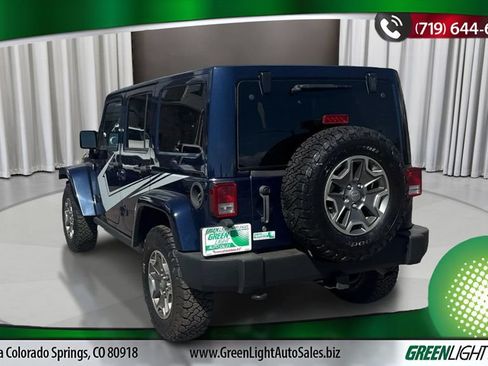Used 2013 Jeep Wrangler Unlimited Rubicon w/ Dual Top Group AWD/4WD image 3