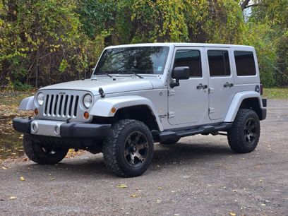 Used 2012 Jeep Wrangler Unlimited Sahara w/ Dual Top Group