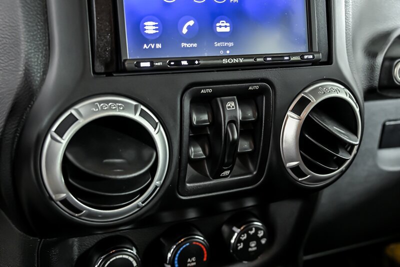 Used 2014 Jeep Wrangler Unlimited Sahara w/ Dual Top Group AWD/4WD image 22