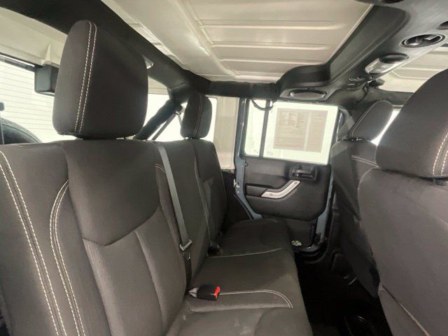 Used 2014 Jeep Wrangler Unlimited Sahara w/ Dual Top Group AWD/4WD image 15