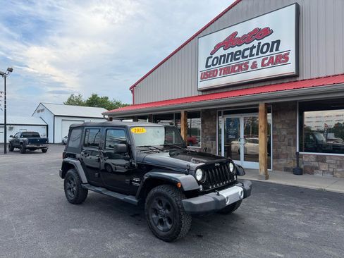 Used 2015 Jeep Wrangler Unlimited Sahara w/ Dual Top Group AWD/4WD image 1