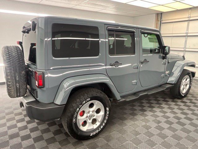Used 2014 Jeep Wrangler Unlimited Sahara w/ Dual Top Group AWD/4WD image 23