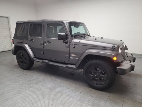 Used 2014 Jeep Wrangler Unlimited Sahara w/ Connectivity Group AWD/4WD image 11