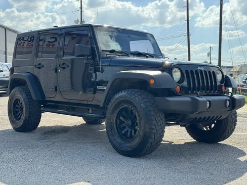 Used 2012 Jeep Wrangler Unlimited Sport AWD/4WD image 9