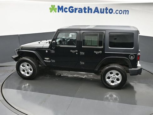 Used 2014 Jeep Wrangler Unlimited Sahara w/ Dual Top Group AWD/4WD image 23