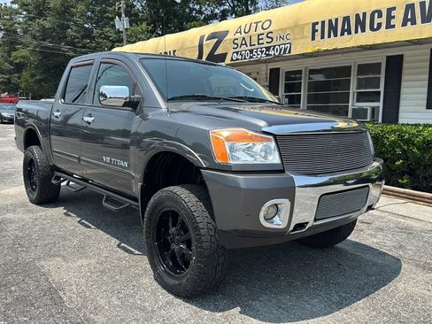 Used 2010 Nissan Titan LE AWD/4WD image 1