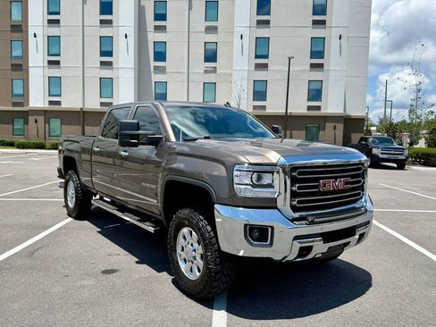 Used 2015 GMC Sierra 2500 SLT w/ Duramax Plus Package AWD/4WD image 1