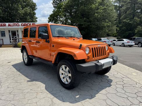 Used 2012 Jeep Wrangler Unlimited Sahara w/ Connectivity Group AWD/4WD image 1