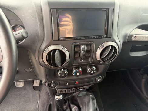 Used 2012 Jeep Wrangler Unlimited Sport AWD/4WD image 8