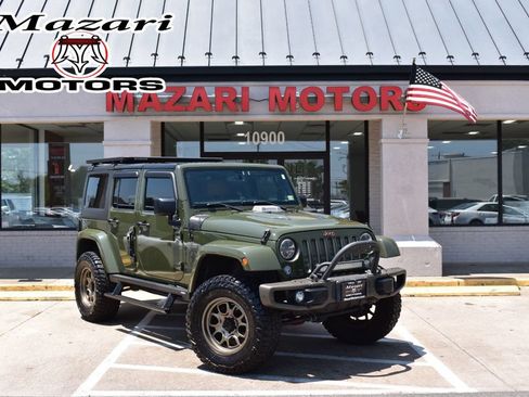 Used 2016 Jeep Wrangler Unlimited Sahara AWD/4WD image 1