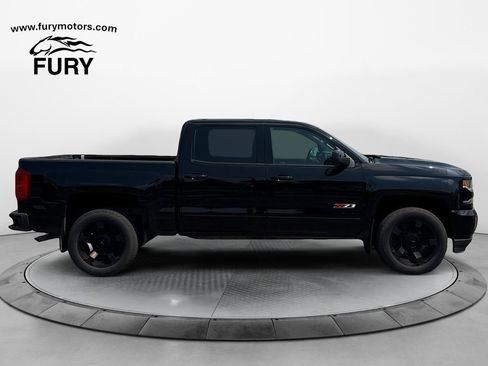 Used 2017 Chevrolet Silverado 1500 LTZ Z71 w/ Realtree Edition AWD/4WD image 2