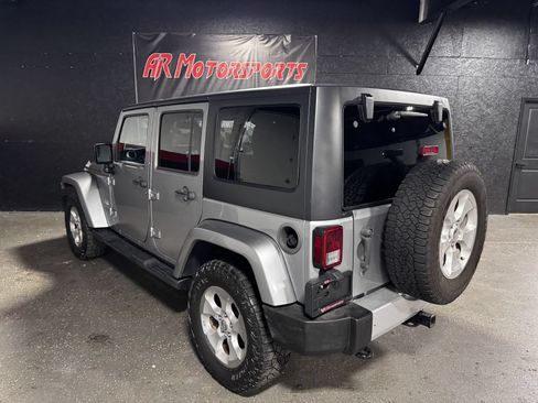Used 2015 Jeep Wrangler Unlimited Sahara w/ Dual Top Group AWD/4WD image 3