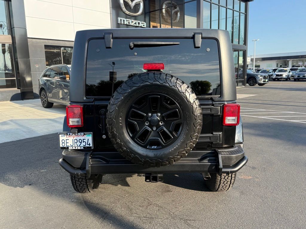 Used 2016 Jeep Wrangler Unlimited Sahara AWD/4WD image 9