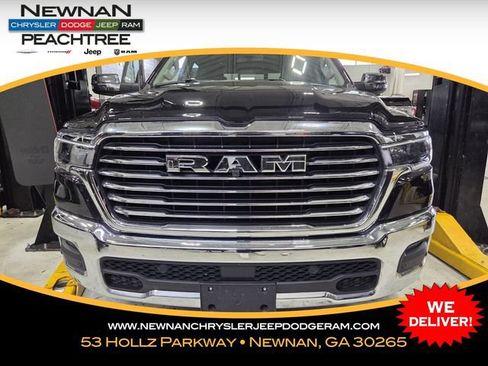 Used 2025 RAM 1500 Laramie AWD/4WD image 1