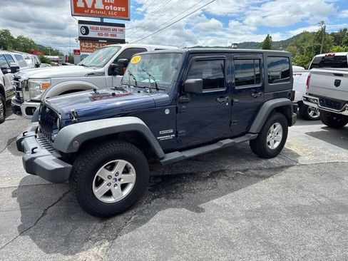 Used 2013 Jeep Wrangler Unlimited Sport AWD/4WD image 1