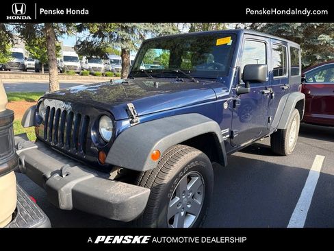 Used 2013 Jeep Wrangler Unlimited Sport AWD/4WD image 1