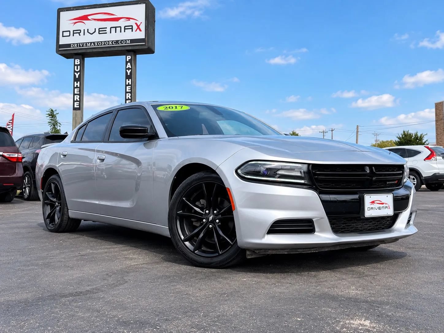 Used 2017 Dodge Charger SE w/ Blacktop Package RWD image 1