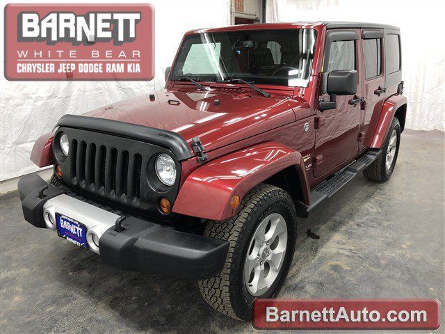 Used 2013 Jeep Wrangler Unlimited Sahara AWD/4WD image 1