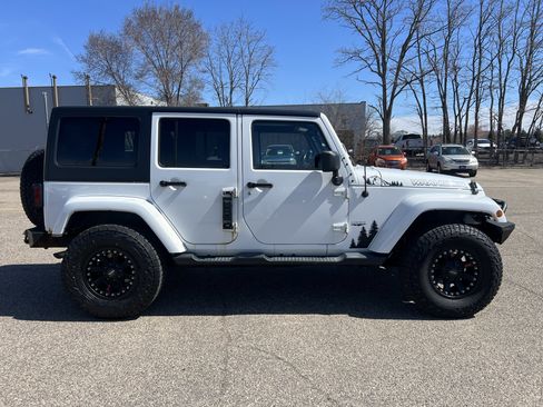 Used 2013 Jeep Wrangler Unlimited Sahara w/ Dual Top Group image 9
