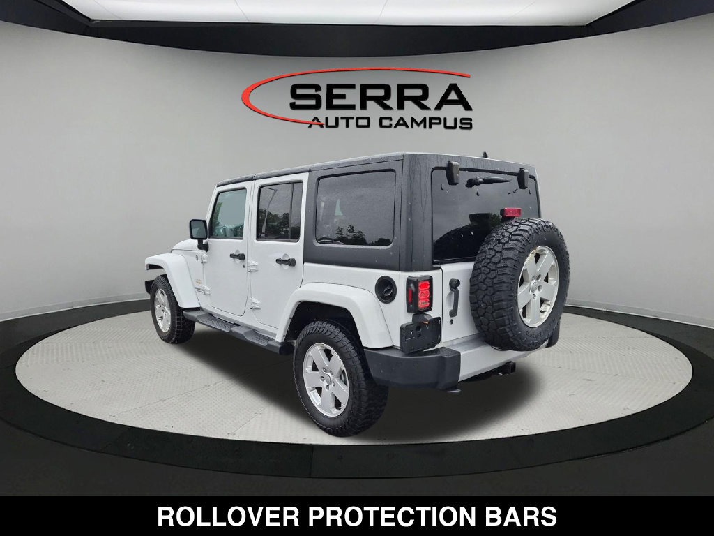 Used 2012 Jeep Wrangler Unlimited Sahara w/ Dual Top Group AWD/4WD image 9