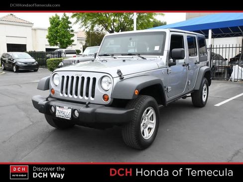 Used 2013 Jeep Wrangler Unlimited Sport AWD/4WD image 1