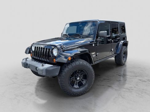 Used 2013 Jeep Wrangler Unlimited Sahara w/ Connectivity Group AWD/4WD image 1