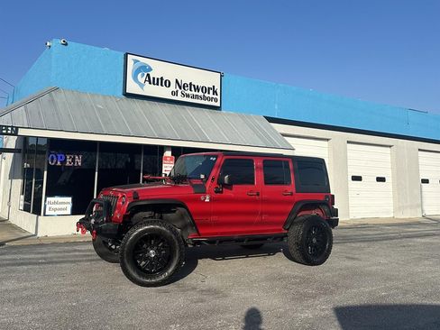 Used 2014 Jeep Wrangler Unlimited Sport w/ Max Tow Package image 1