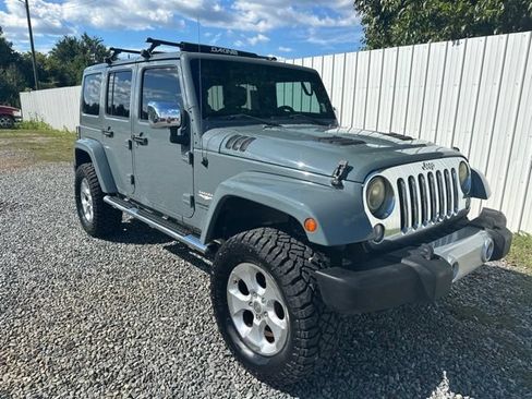 Used 2014 Jeep Wrangler Unlimited Sahara w/ Mopar Chrome Edition Group AWD/4WD image 7