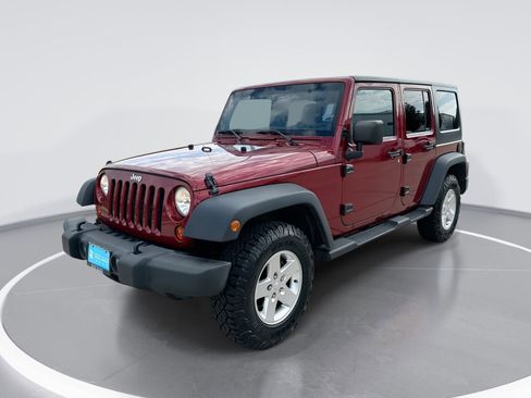 Used 2012 Jeep Wrangler Unlimited Sport AWD/4WD image 1