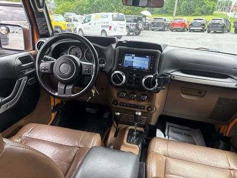 Used 2012 Jeep Wrangler Unlimited Sahara w/ Dual Top Group AWD/4WD image 8