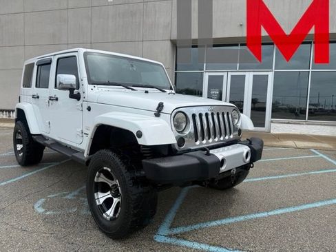 Used 2014 Jeep Wrangler Unlimited Sahara w/ Connectivity Group AWD/4WD image 1
