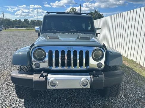 Used 2014 Jeep Wrangler Unlimited Sahara w/ Mopar Chrome Edition Group AWD/4WD image 8