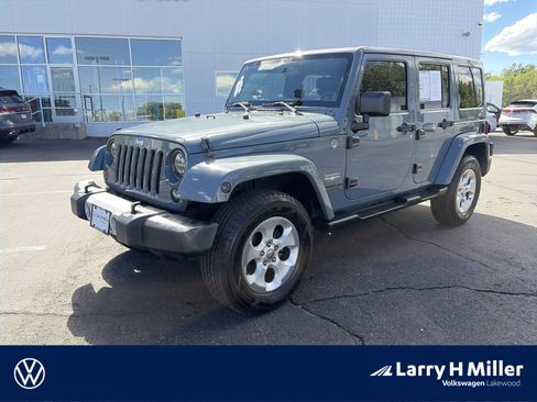 Used 2014 Jeep Wrangler Unlimited Sahara w/ Max Tow Package AWD/4WD image 1