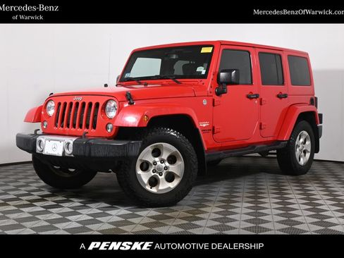 Used 2015 Jeep Wrangler Unlimited Sahara w/ Dual Top Group AWD/4WD image 1