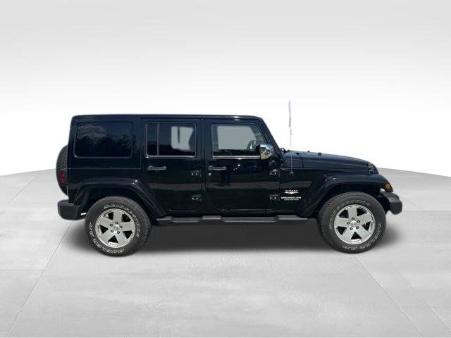 Used 2012 Jeep Wrangler Unlimited Sahara w/ Dual Top Group AWD/4WD image 2