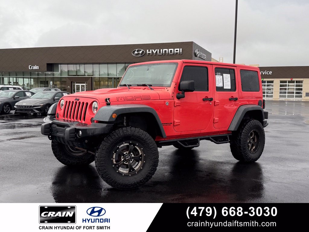 Used 2013 Jeep Wrangler Unlimited Sahara AWD/4WD image 1