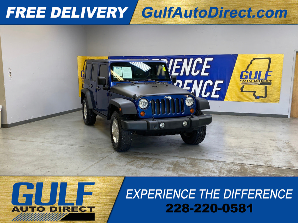 Used 2009 Jeep Wrangler Unlimited Rubicon w/ Dual Top Group AWD/4WD image 1