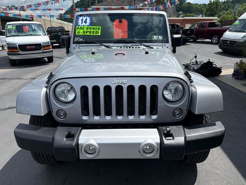 Used 2014 Jeep Wrangler Unlimited Sahara w/ Dual Top Group AWD/4WD image 30