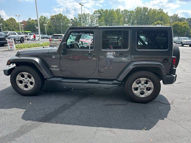 Used 2014 Jeep Wrangler Unlimited Sahara w/ Connectivity Group AWD/4WD image 7