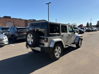 Used 2012 Jeep Wrangler Unlimited Sahara w/ Dual Top Group AWD/4WD video 2
